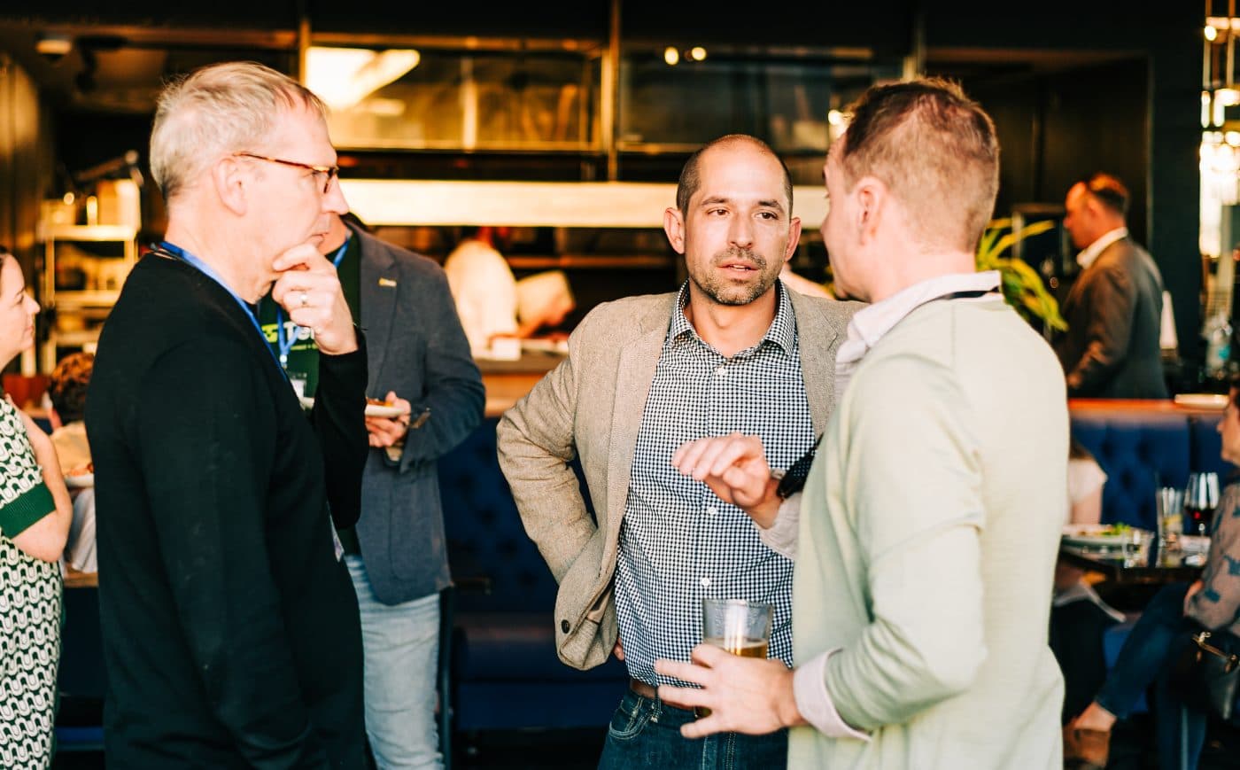 Dave in conversation with attendees at Brand Fusion